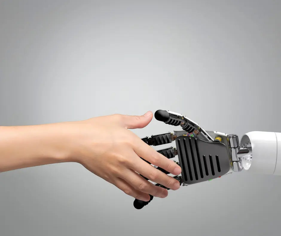 A human hand and a robotic hand reaching out and connecting, symbolizing collaboration or partnership between people and artificial intelligence.